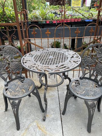 Cast iron table chairs hot sale